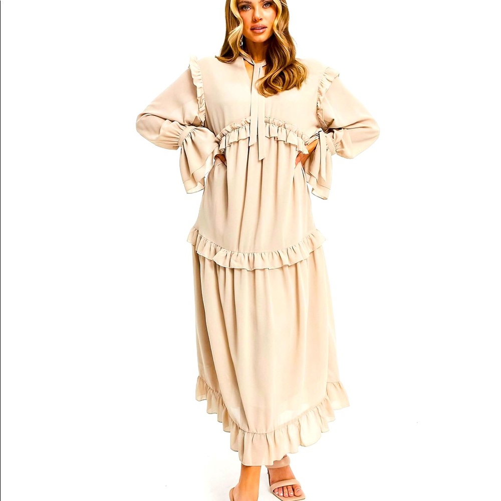 Long layered ruffle maxi. loose fitting. Tags never worn.